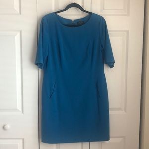 TAHARI shift dress with front pockets.
